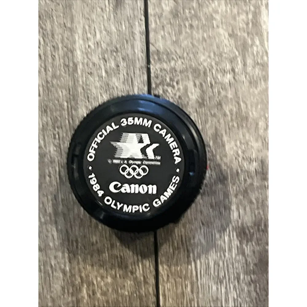 Canon Lens FD 50mm 1:1.8 w/ 1984 Olympic Games Official 35mm Camera Lens Cap